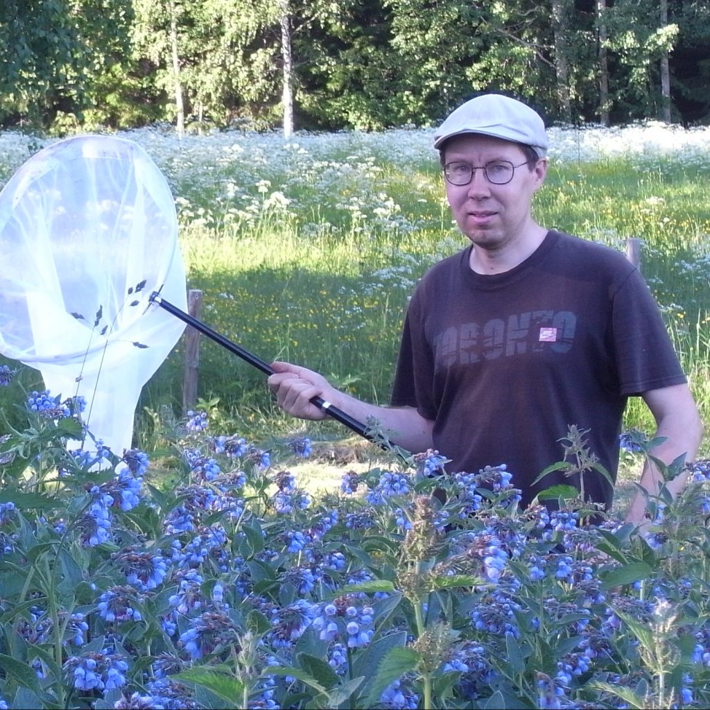 Juho Paukkunen with an insect net