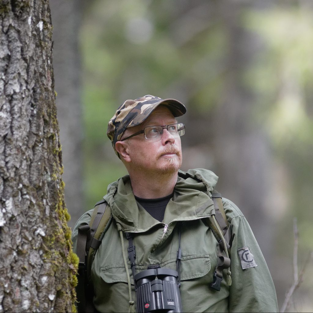 Philippe Fayt next to an aspen