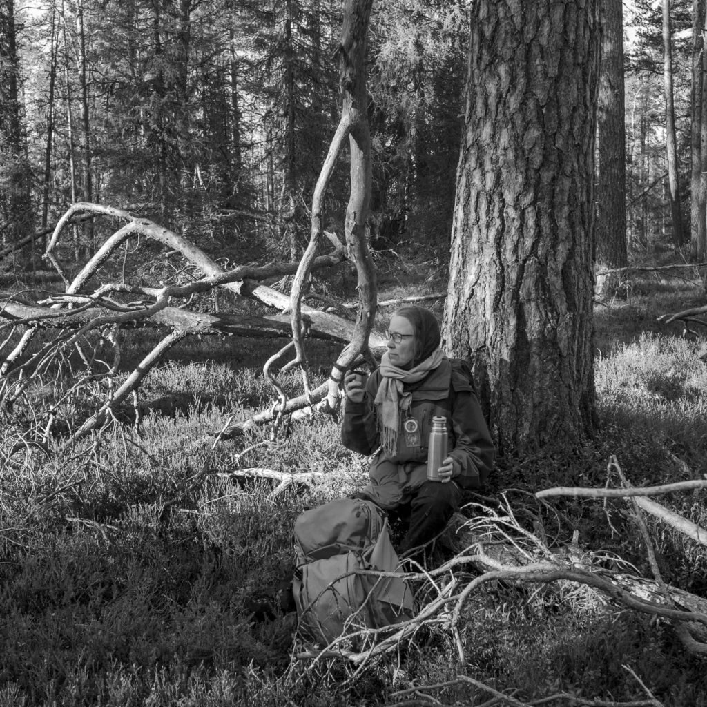 Sanni Seppo working in the forest